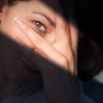 Close-up of woman’s eye showing fine lines and early signs of aging on the skin